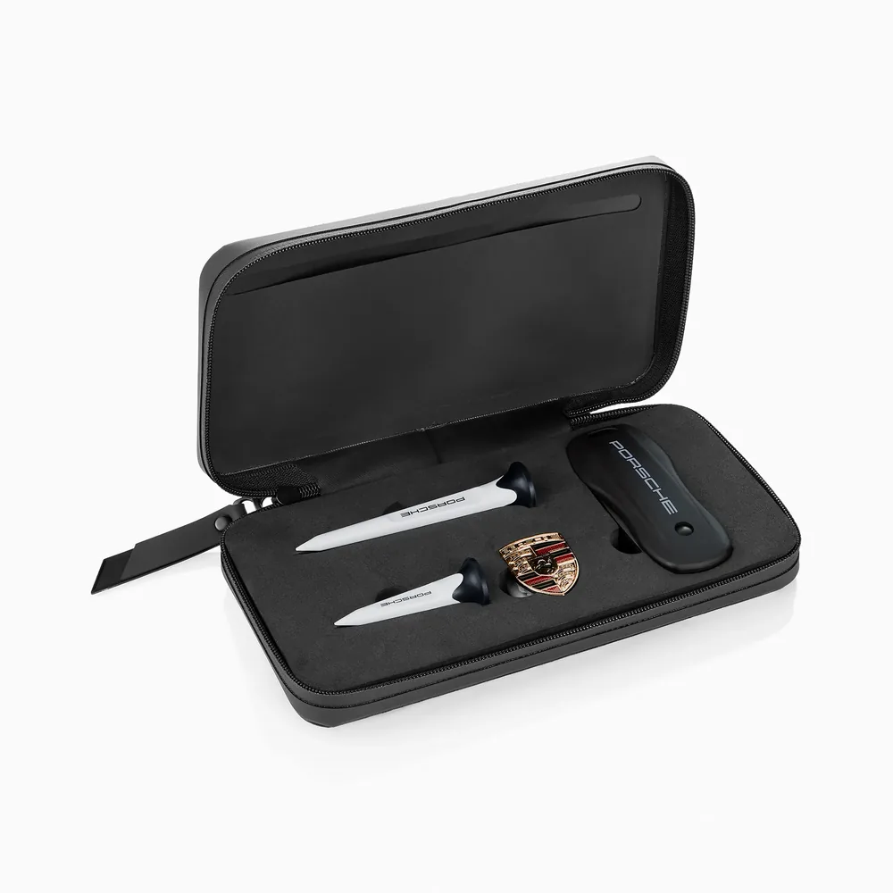 Porsche golf divot tool set displayed in its open case